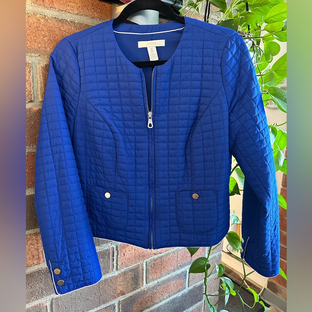 Royal blue shoulder padded quilted jacket.
